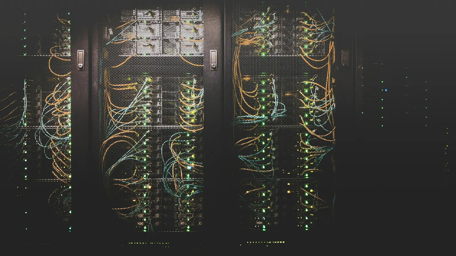 Cabling behind the open doors of server racks